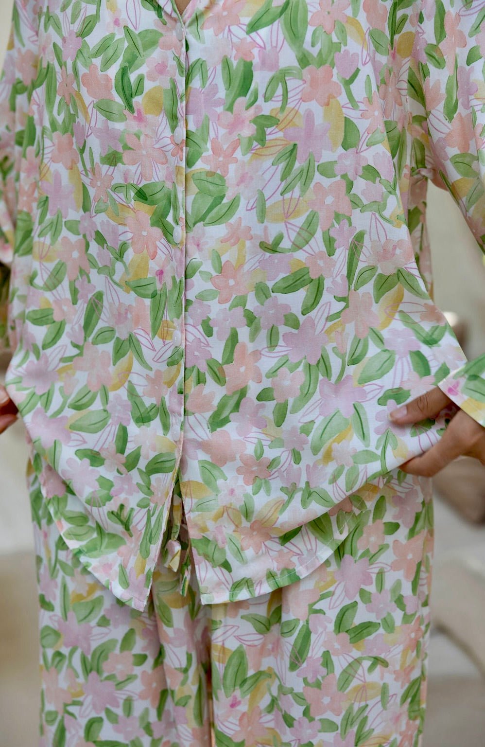 Women’s long pyjama set in soft floral print with button-up top and relaxed pants