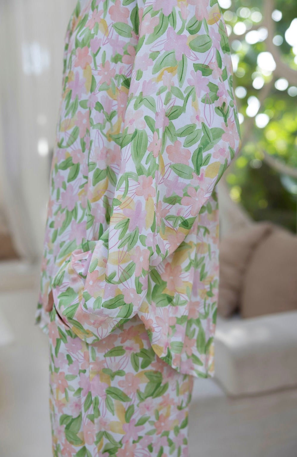 close-up Women’s long pyjama set in soft floral print with button-up top and relaxed pants