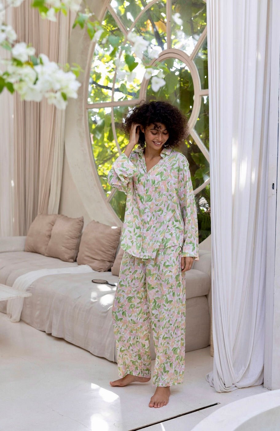 Women’s long pyjama set in soft floral print with button-up top and relaxed pants