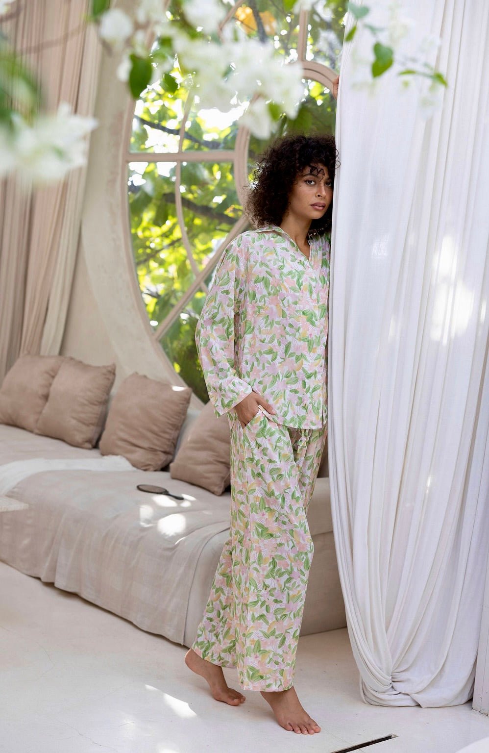 Women’s long pyjama set in soft floral print with button-up top and relaxed pants